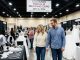 Engaged couple browsing wedding gowns and bridal accessories at the Colorado Bridal and Wedding Expo on November 8, 2026, at the Colorado Springs Event Center