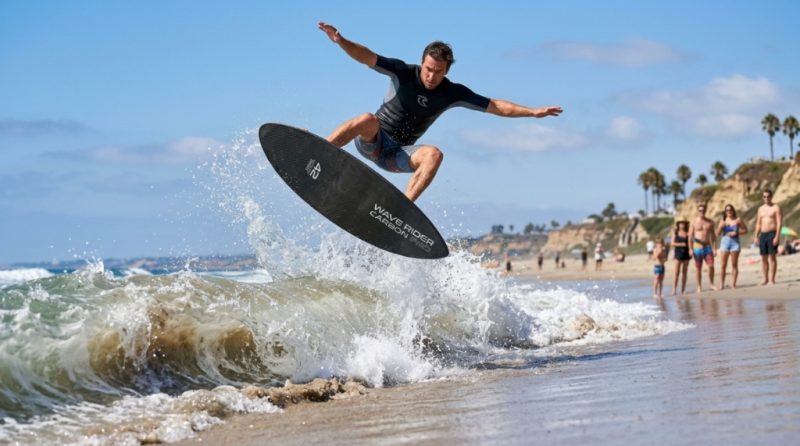 Fiberglass skimboard resting on wet sand with ocean waves at sunset.